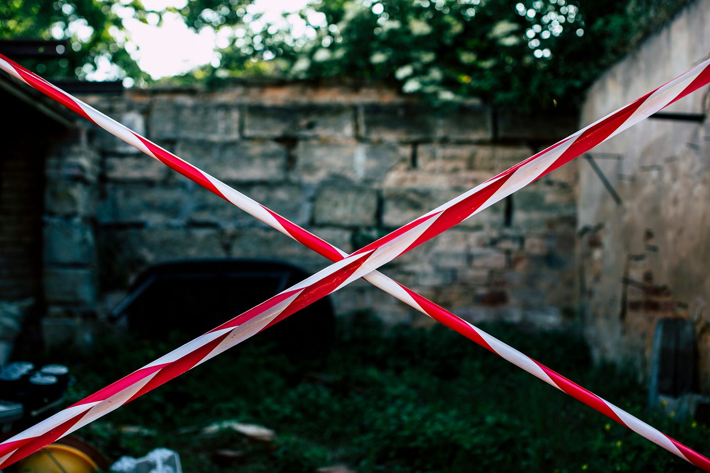 An outdoor area blocked off with tape