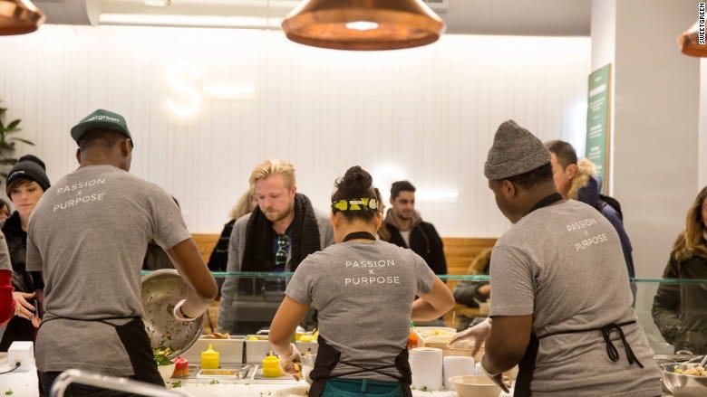 Sweetgreen staff wearing t-shirts reading ‘Passion x Purpose’.