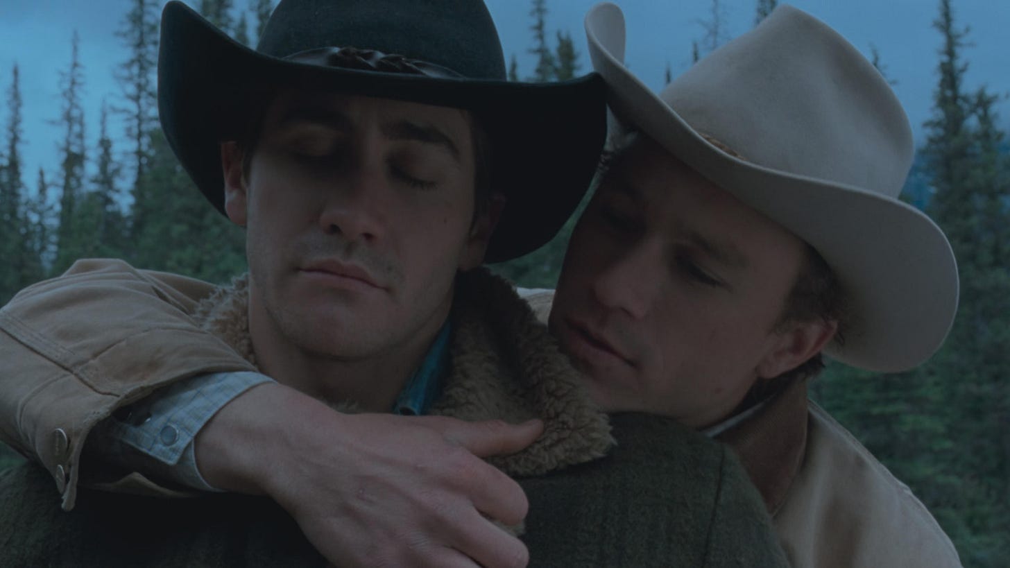 Brokeback Mountain | Still features Heath Ledger with his arm wrapped around Jake Gyllenhaal.