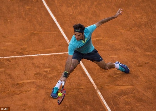 roger federer returning to nick kyrgios at 2015 madrid open