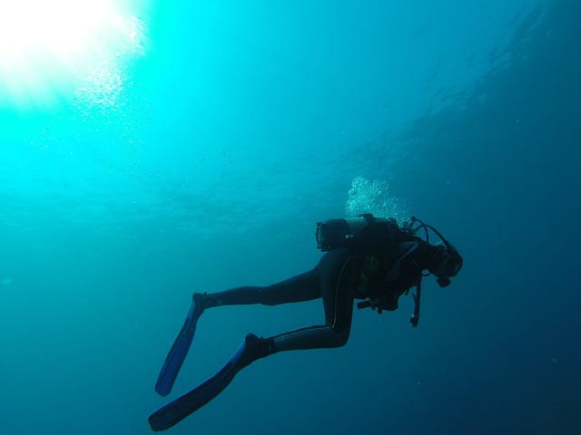 scuba diver with oxygen tank