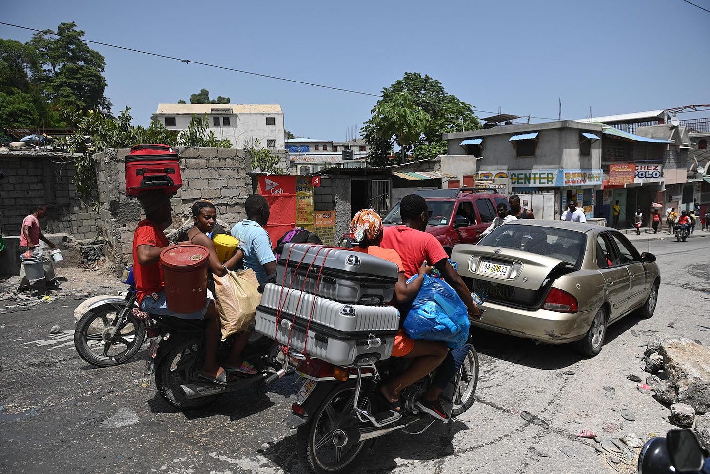 Residents evacuate Haiti.