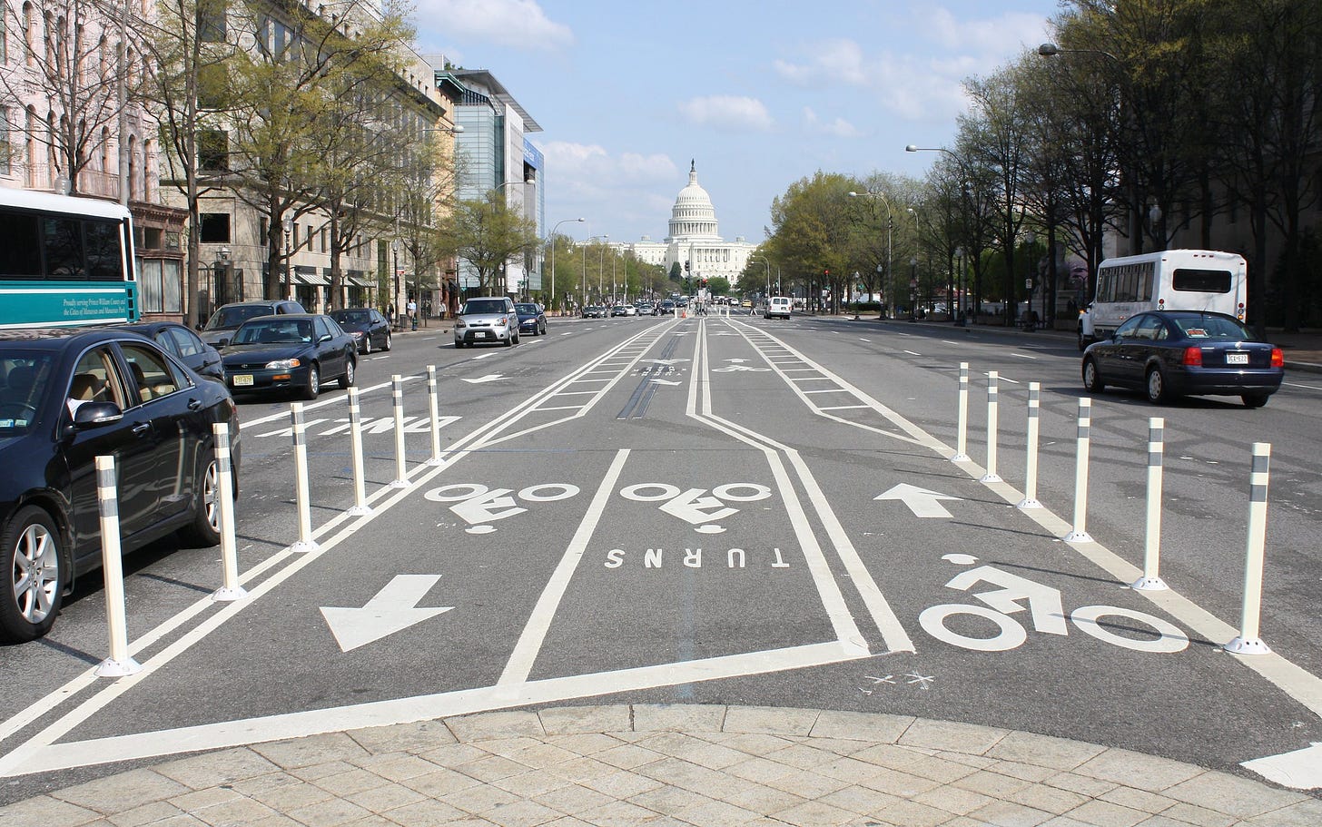bikes lanes on street going toward U.S. Capitol building.