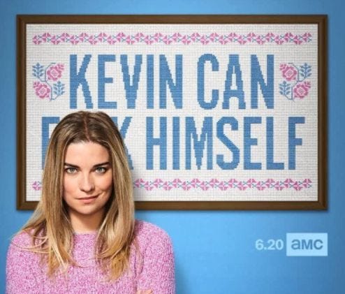 This may contain: a woman standing in front of a sign that says kevin can f k himself