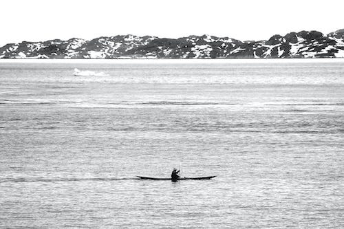 lone kayaker on open water