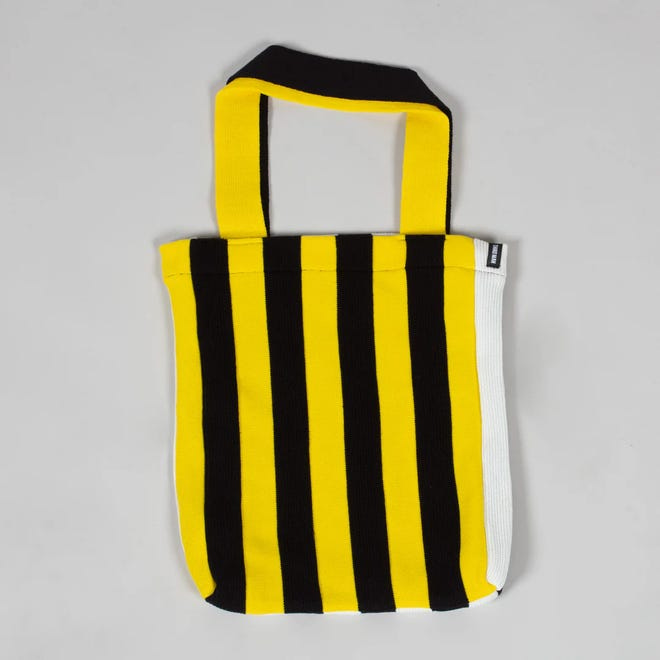 This knit stripe tote is on sale for $40.60 at thirdmanrecords.com. Musician Jack White is known for his use of color.