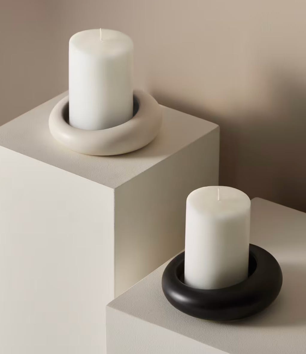 candle holder is designed with a round dipped base 