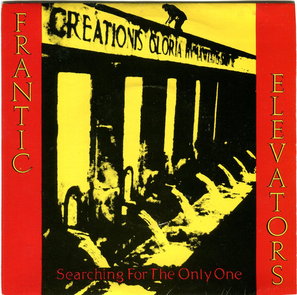 Picture sleeve for the Frantic Elevators’ single Searching For The Only One. It’s in red, yellow and black. I can’t tell what the photo is.