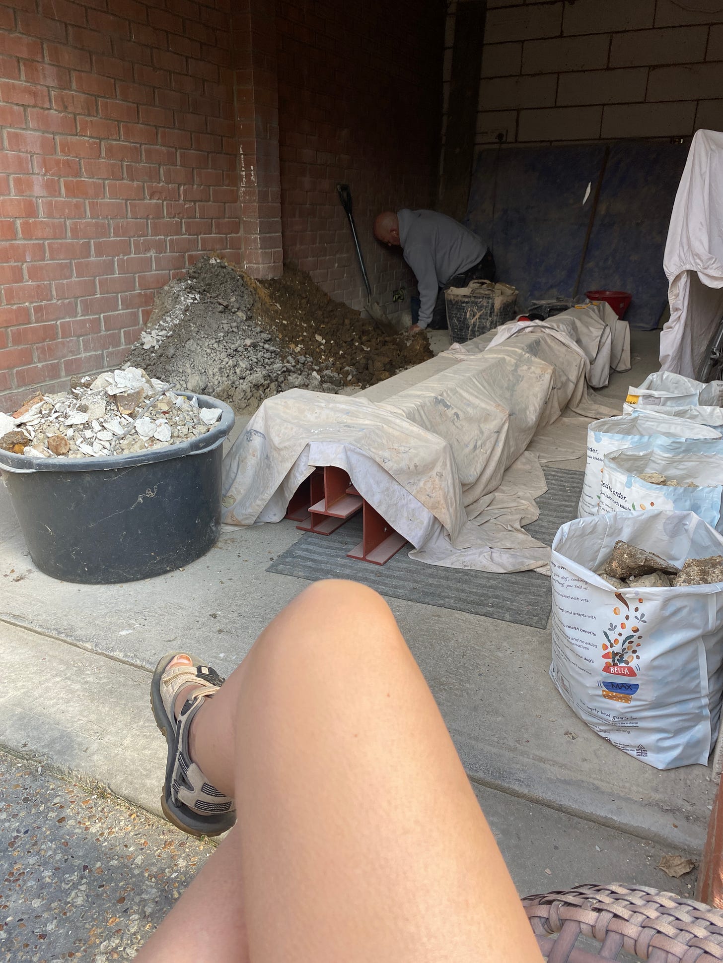 garage covered with debris and soil dug out from the footings