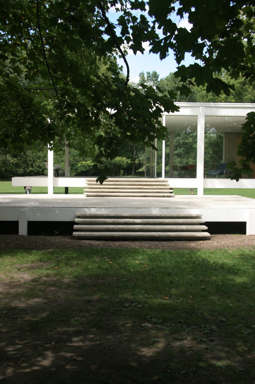 A white building with stairs with Farnsworth House in the background

Description automatically generated with medium confidence