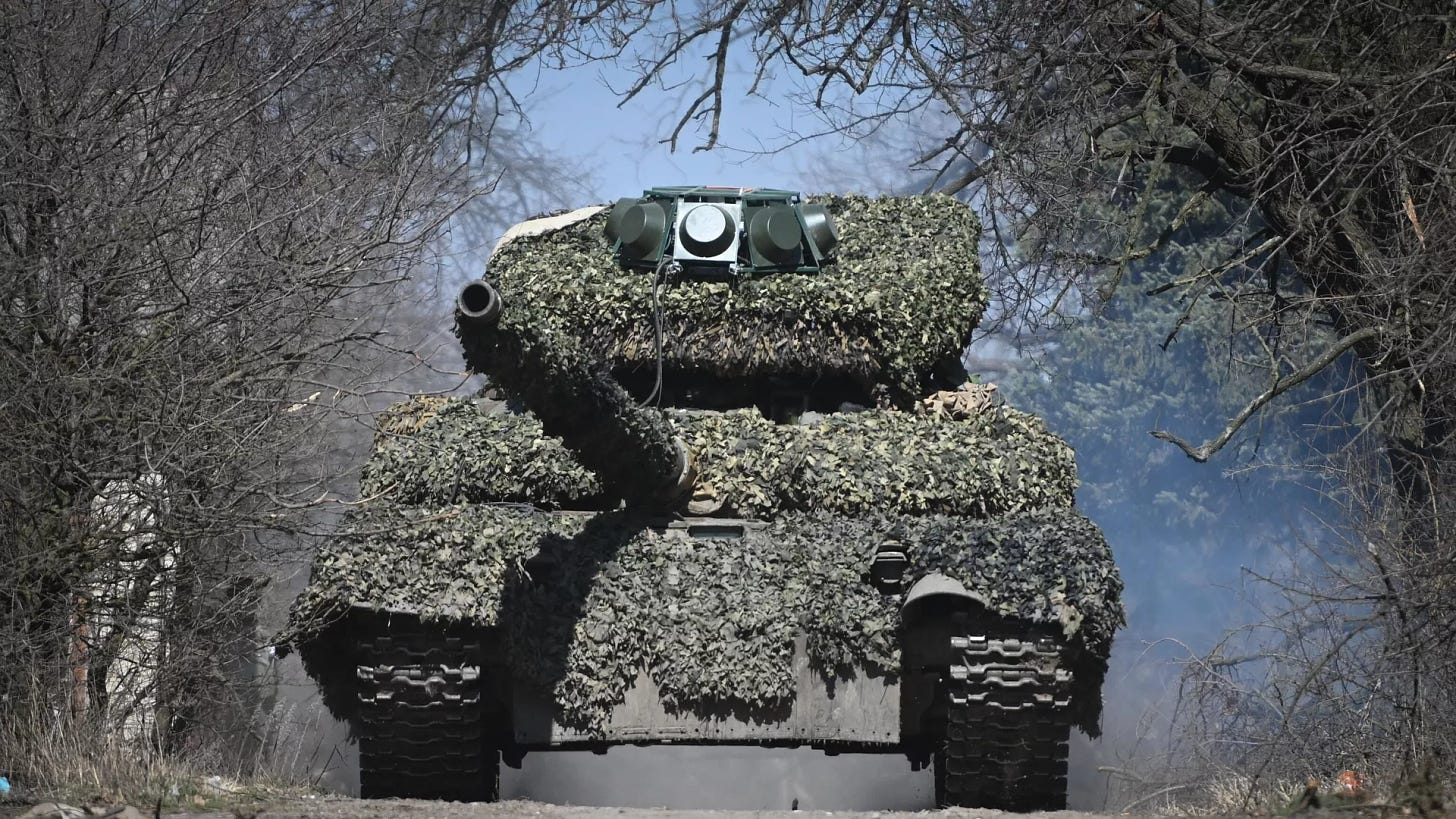 Russia's T-72 tank equipped with anti-drone protection is seen in the special military operation zone. File photo - Sputnik International, 1920, 24.04.2024