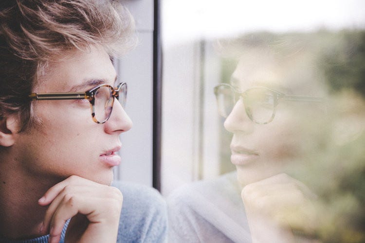 man in glasses from article The Highly Sensitive Person (HSP) Make up to 50% of Our Clients