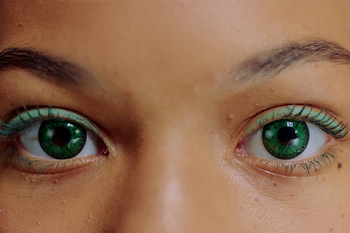 Free Close-up of woman with green contact lenses Stock Photo