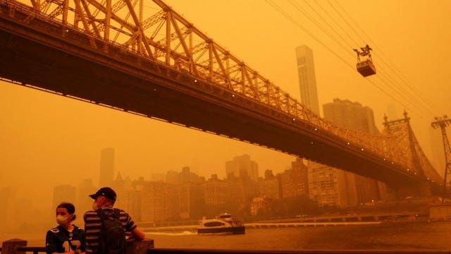 Eerie streets and vanishing skyscrapers: I walked New York as the wildfire  smog descended