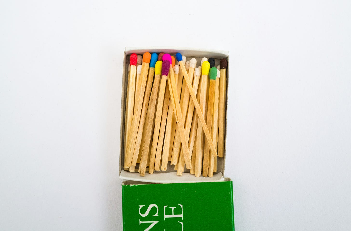 box of matches. match heads are each a different color