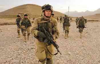 George W. Bush in military gear in a desert