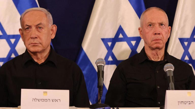 Israeli Prime Minister Benjamin Netanyahu, left, is seen during a news conference with then-Israeli Defense Minister Yoav Gallant. 