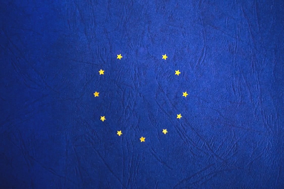 Free Blue and Yellow Round Star Print Textile Stock Photo