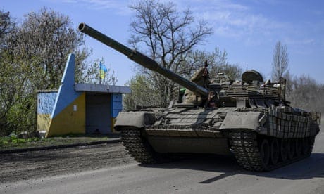 Ukrainian soldiers in a tank on the frontline in Donetsk