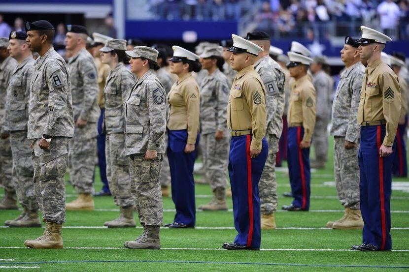 Members of the Military are honored during halftime of the Dallas Cowboys-Arizona Cardinals...