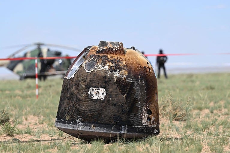 The scorched return capsule of the Chang'e-6 probe following its touch down in Mongolia.