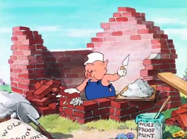 One of the pigs from "The Tree Little Pigs" cartoon is laying bricks for his house