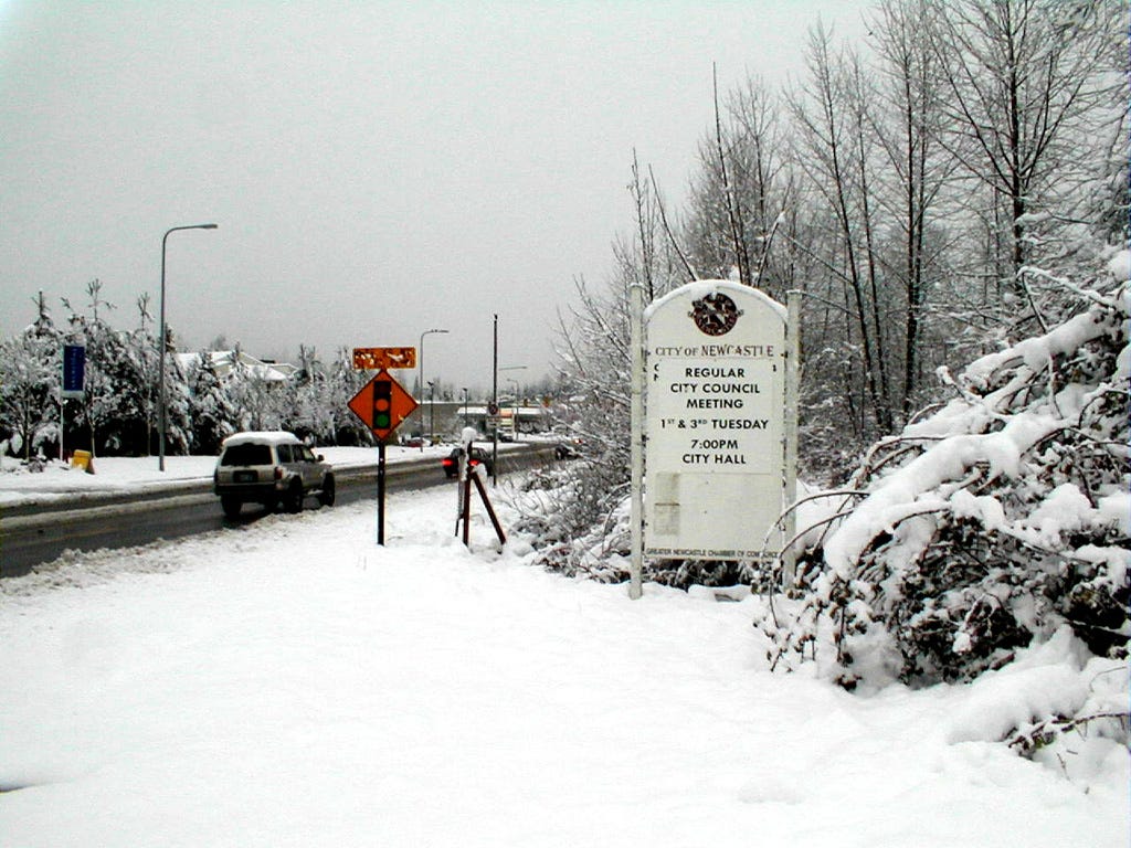 Newcastle welcome sign on a snowy day