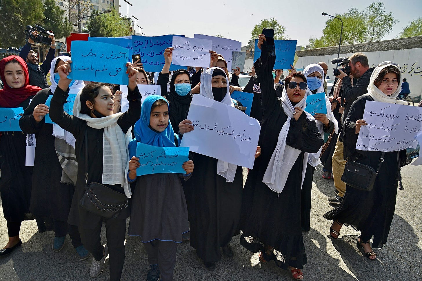 Defying Taliban, Afghan women protest to demand rights - Democracy Digest