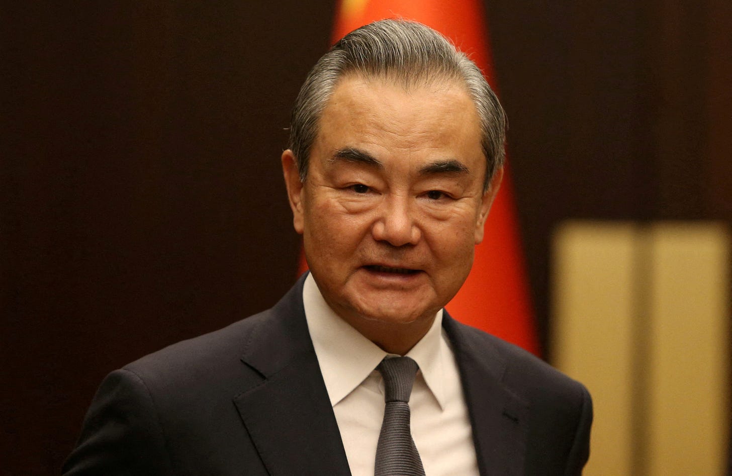 China's Wang Yi makes first statement after reappointment as foreign minister
