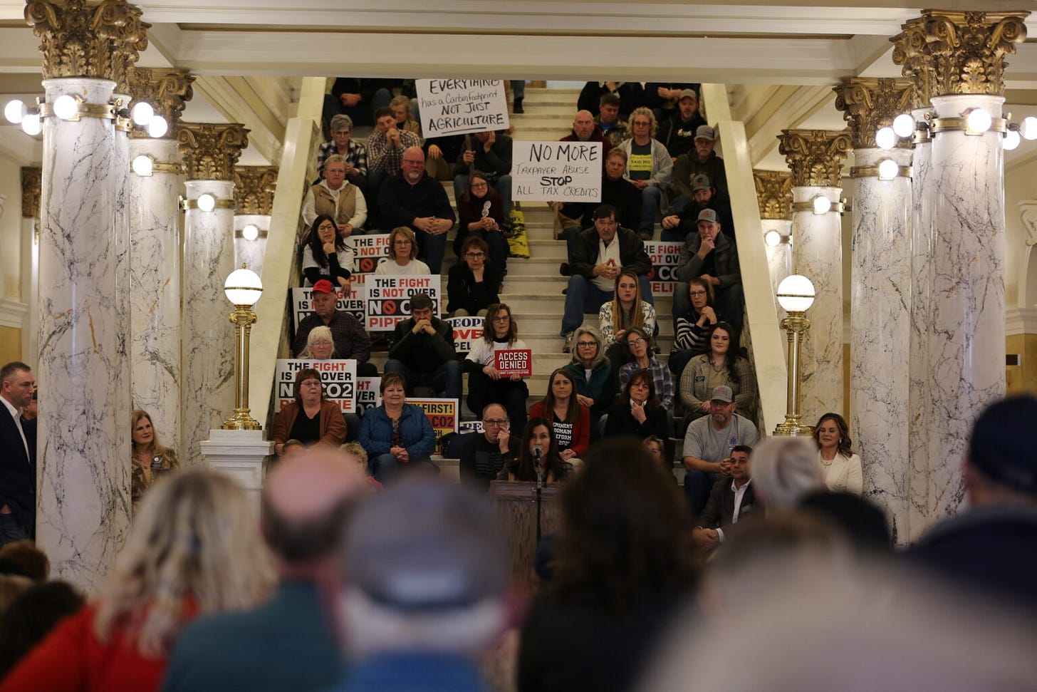 Rep. Karla Lems, R-Canton, speaks to hundreds of rally attendees in Pierre on Jan. 13, 2025, during an event highlighting opposition to a carbon dioxide pipeline. (Joshua Haiar/South Dakota Searchlight)