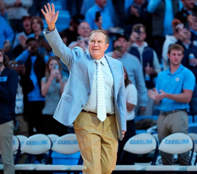 North Carolina football coach Bill Belichick is introduced during half time of a men's basketball game at Dean E. Smith Center.