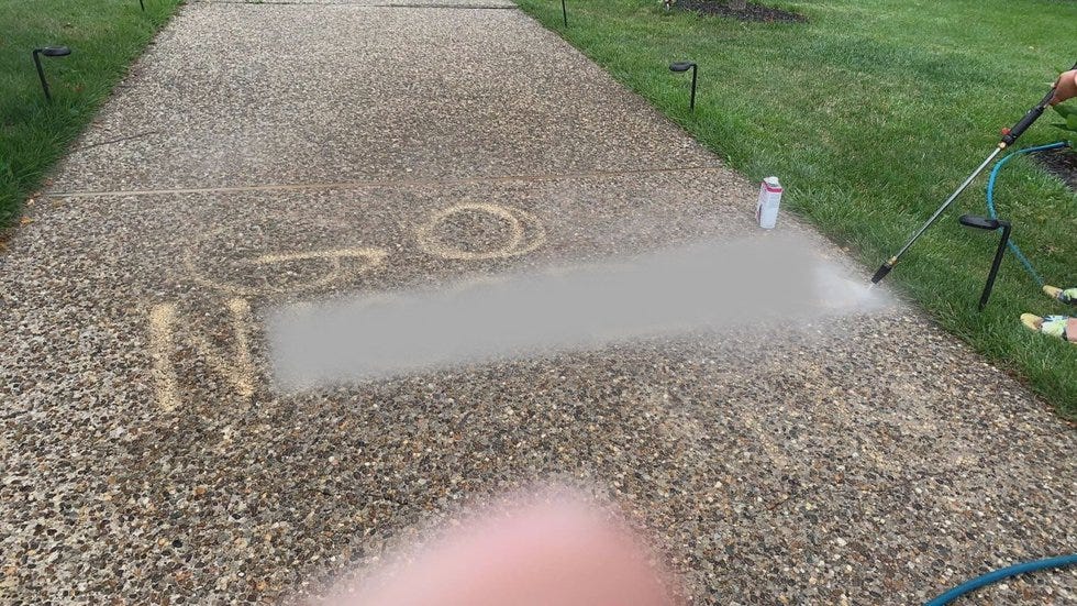 A Louisville family says they have repeatedly had racial slurs spray painted on their driveway.