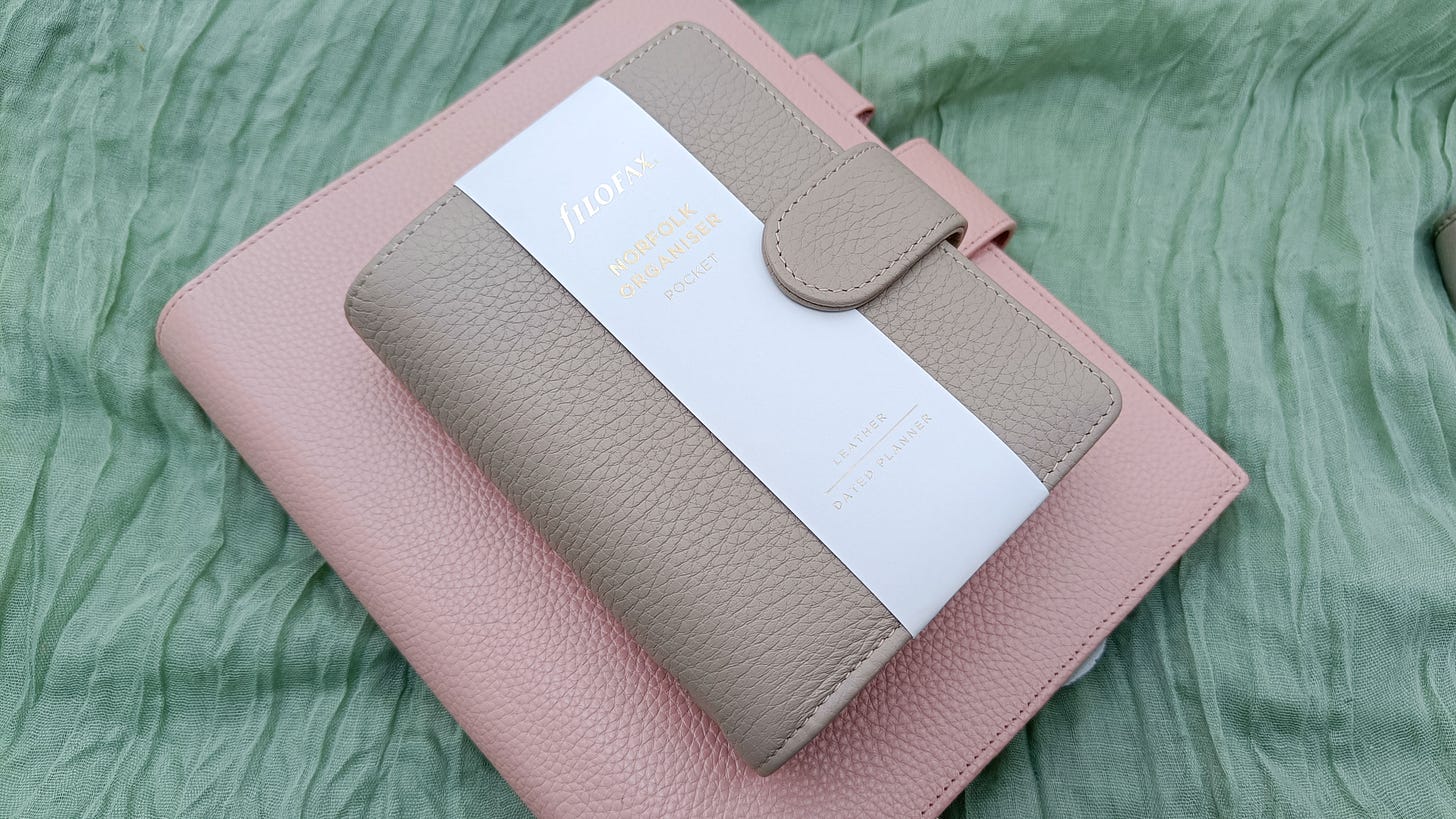 A5 Moterm Luxe 2.0 in dusty pink, and a Filofax Norfolk Pocket Size in Taupe. 