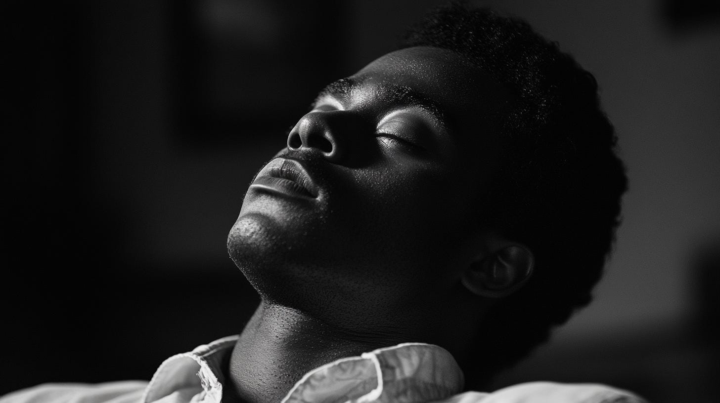 The last scene of his summer romance. cinematic black and white portrait of a twenty-something year old black man