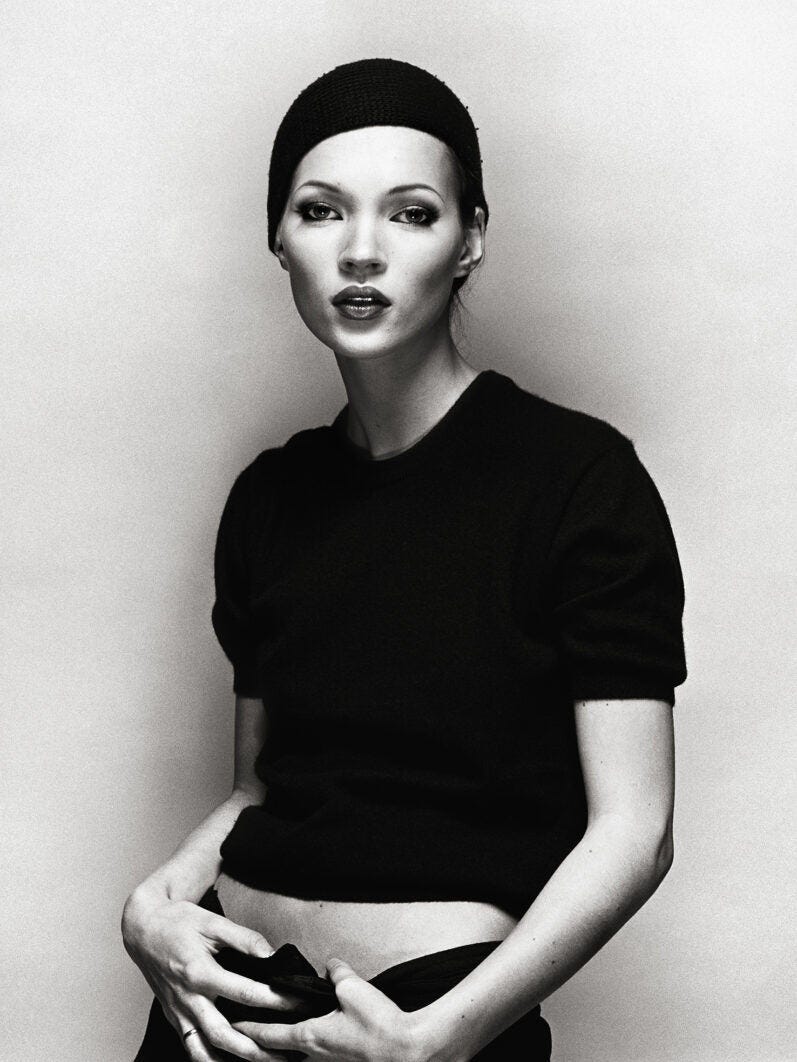 Photo shows portrait of Kate Moss posing for The Face Magazine