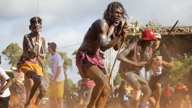 Yolngu clans perform bunggul dances, an ancient expression of culture and knowledge, at the Garma festival.