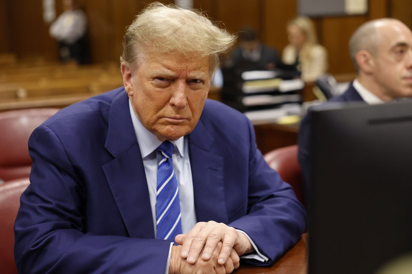 Donald Trump sits in the courtroom during the second day of his criminal trial at Manhattan Criminal Court on April 16.