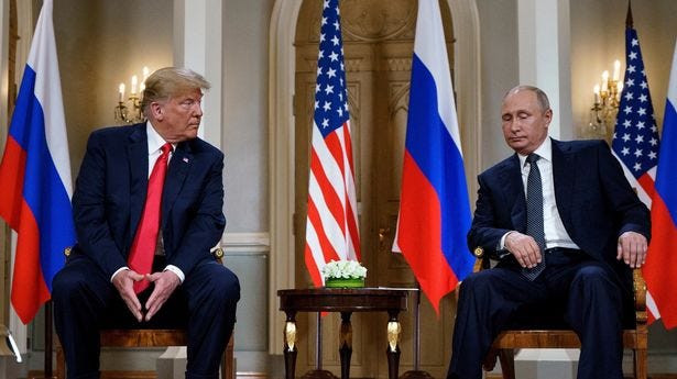 Russian President Vladimir Putin (R) and US President Donald Trump