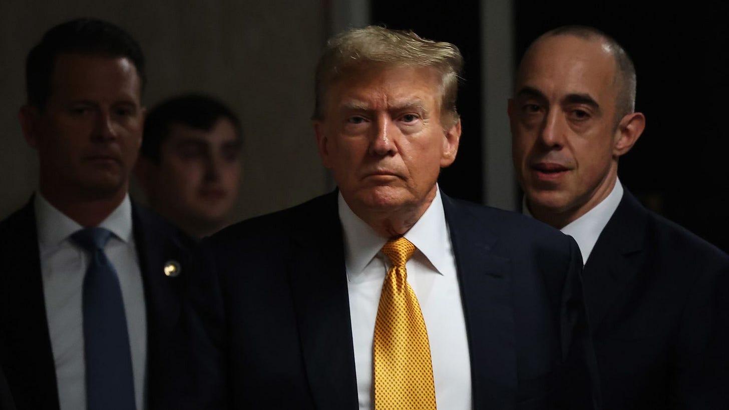 Former U.S. President Donald Trump returns after a break during his hush money trial at Manhattan Criminal Court in New York City on May 21, 2024.