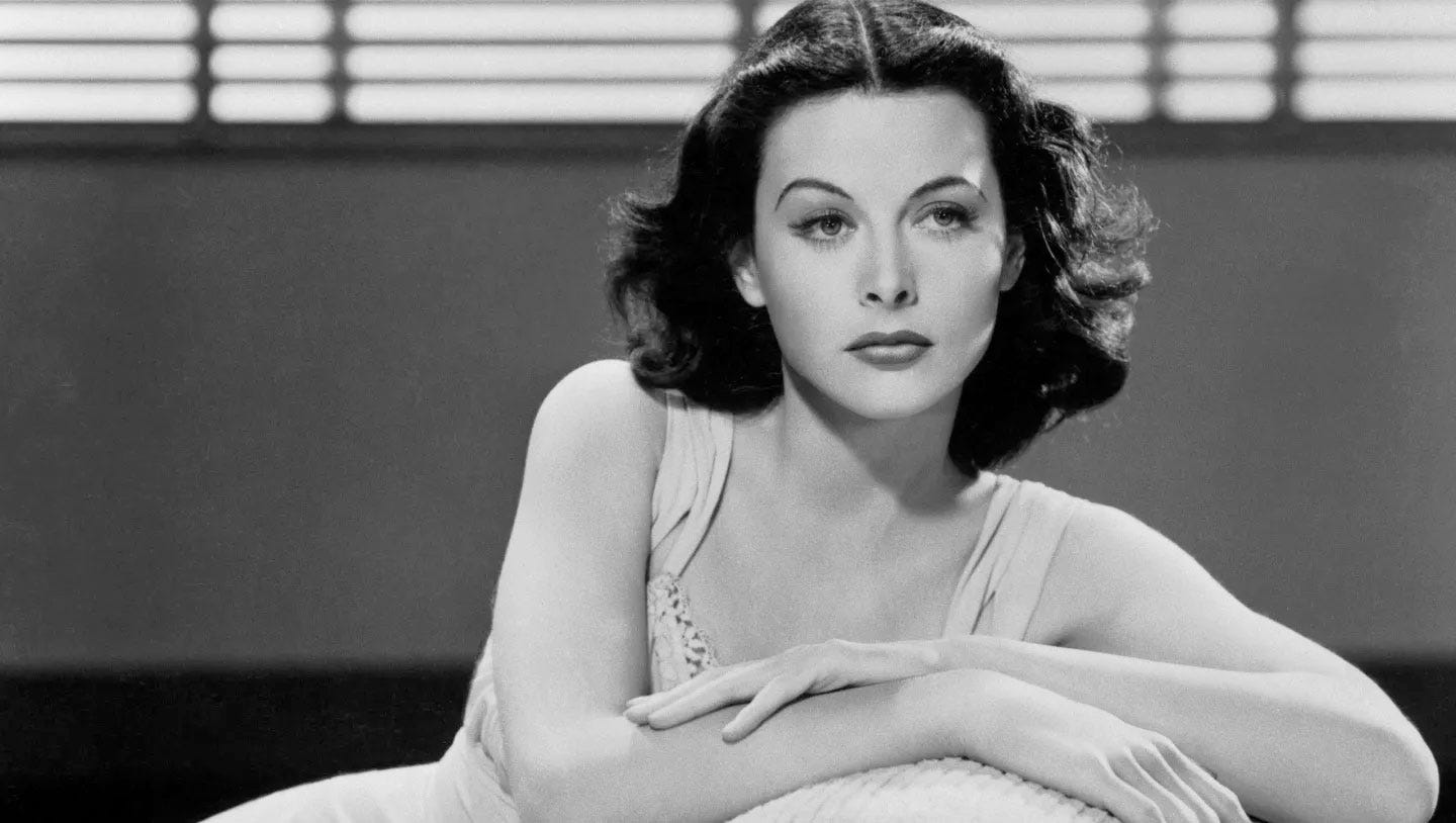 Hollywood star Hedy Lamarr looks engmatically out of shot in a black and white publicity still