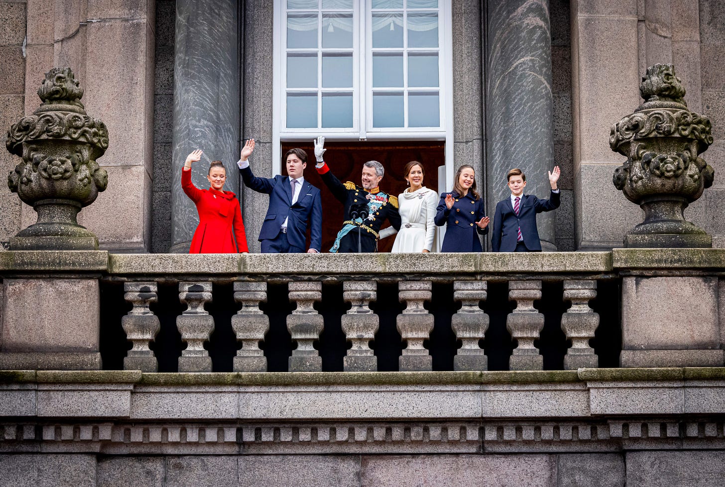 king frederik and queen mary on balcony with their children