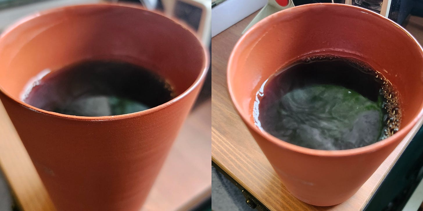 Close-ups of red clay cups filled with coffee.