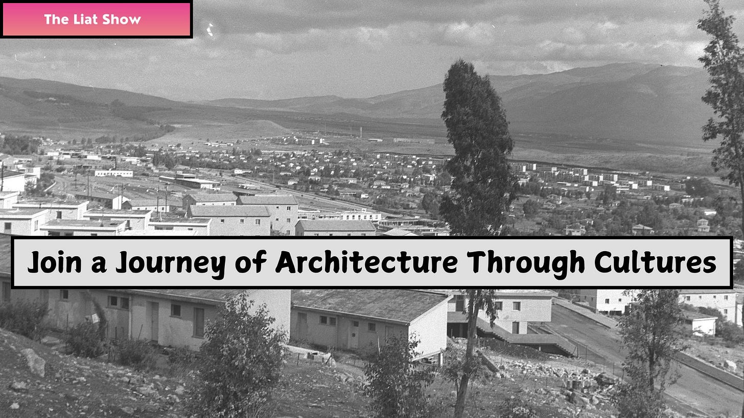 A black-and-white panoramic view of Kiryat Shmona in 1964. The foreground shows low-rise residential buildings built on a rocky hillside, with trees scattered between them. In the background, a dense urban area with rectangular housing blocks stretches across the valley, framed by rolling hills and distant mountains. The image captures the early stages of a development town built to house new immigrants in northern Israel.