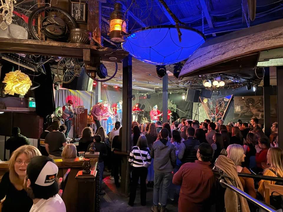 May be an image of 5 people, lighting and crowd