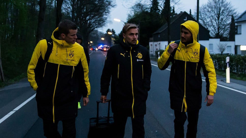 Borussia Dortmund team work to overcome bomb attack 2017 images