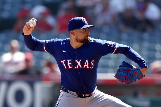 Nathan Eovaldi of the Texas Rangers throws a pitch during the first inning against the Los Angeles Angels at Angel Stadium of Anaheim on September...