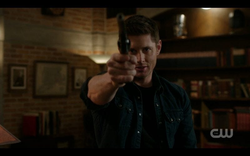 supernatural dean winchester holding colt up