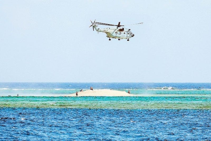 Philippine scientists harassed by China helicoper