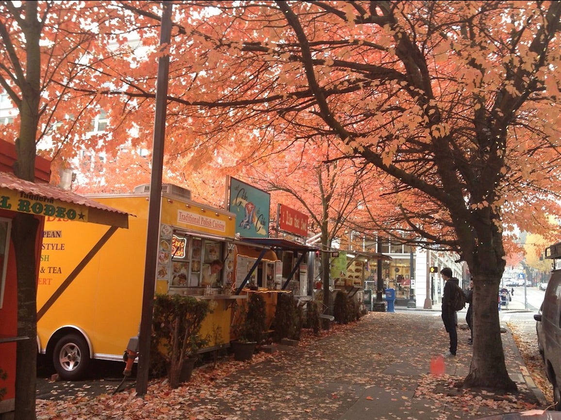 Portland food carts under orange fall foliage