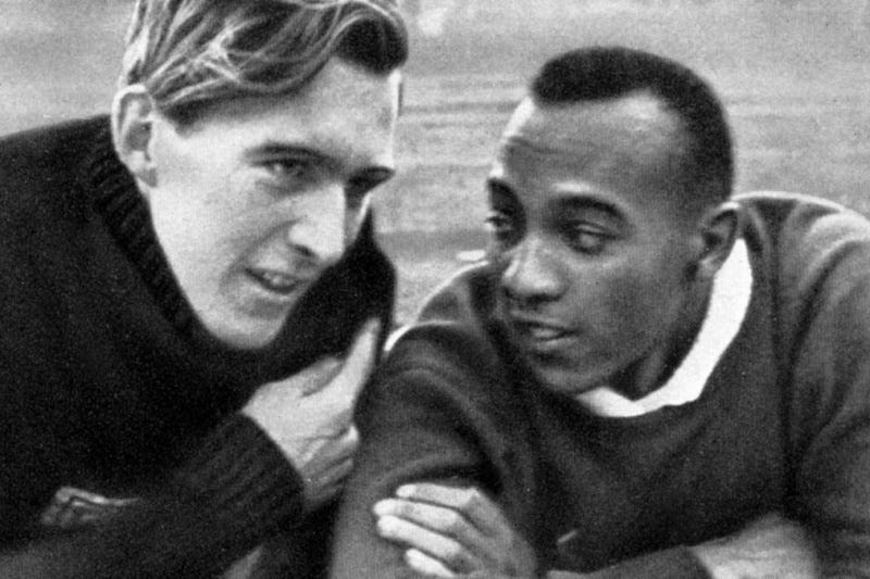 Carl (Luz) Long and Jesse Owens chatting at the 1936 Olympics